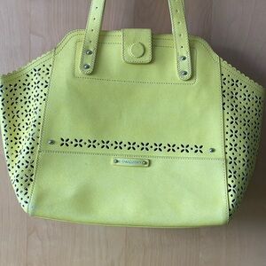 Yellow spring shoulder purse with cute cut out design